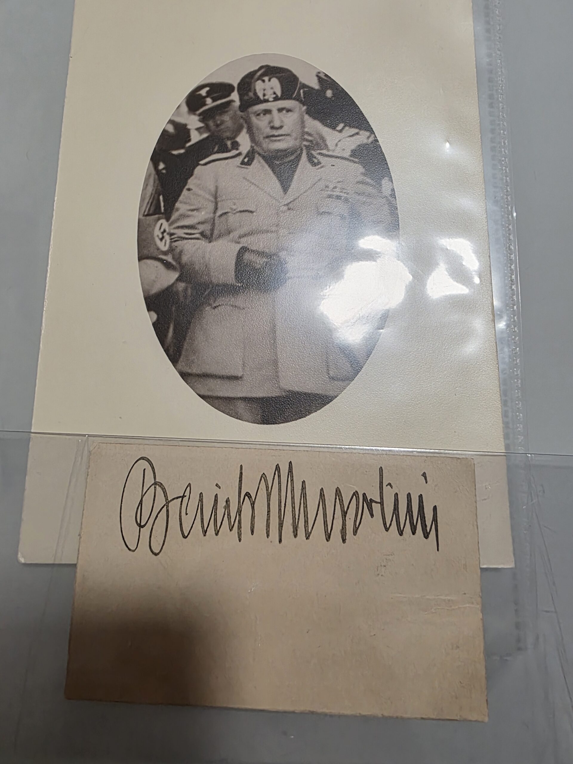 Mounted portrait image accompanying Benito Mussolini autograph display