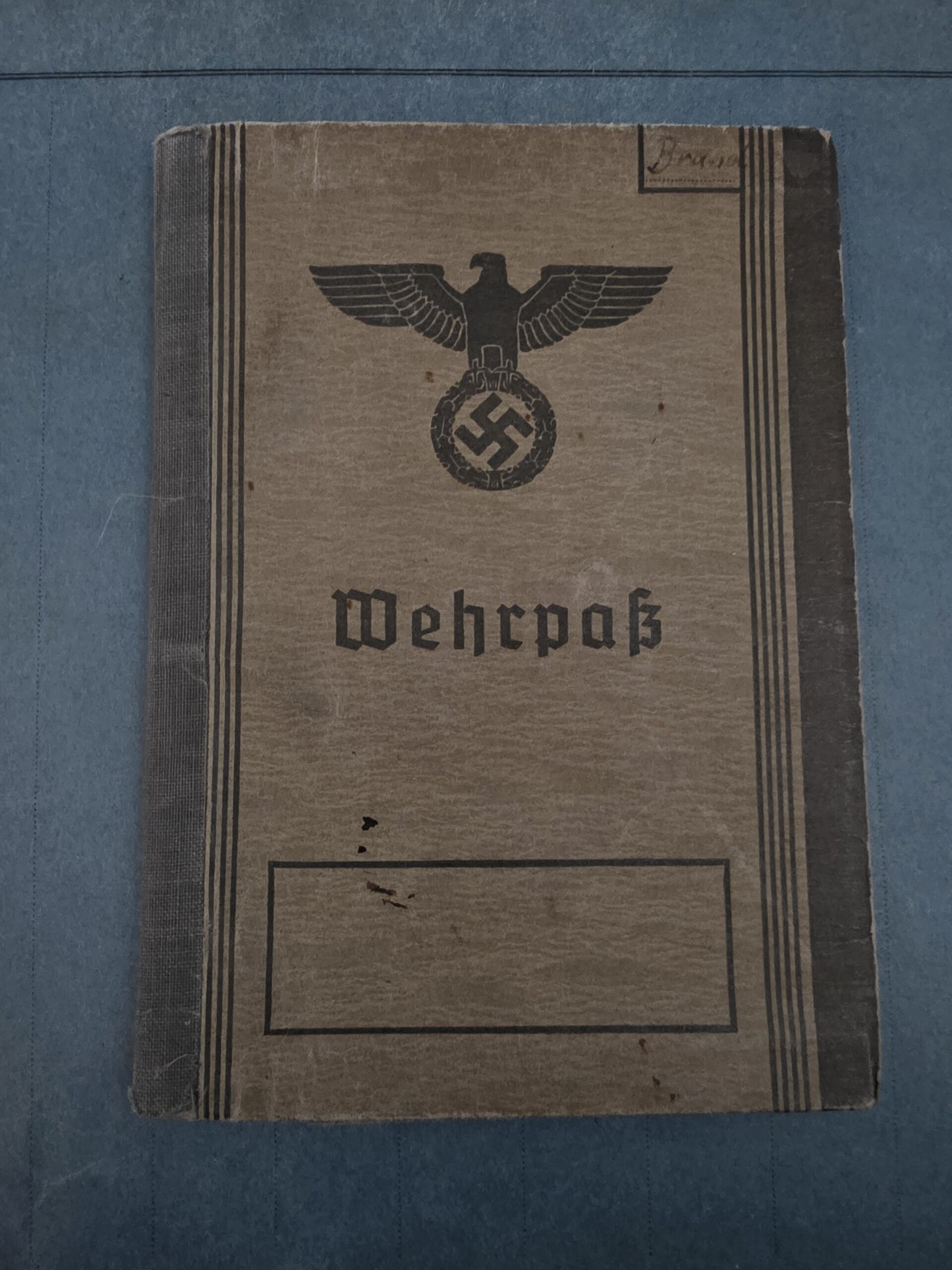 WWII German Wehrpass issued to Peter Bränd with original period cover