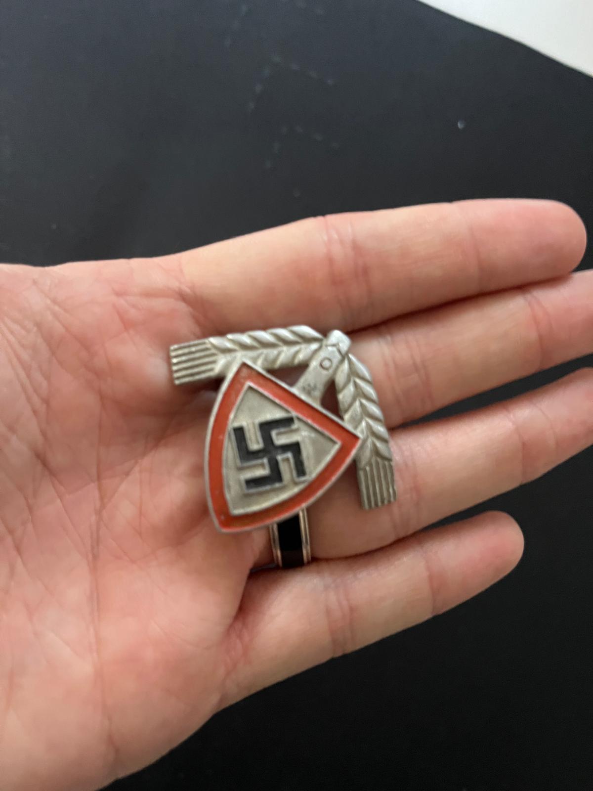 Original WWII German RAD Leader Cap Badge Original WWII German RAD leader cap badge with red enamel and black swastika