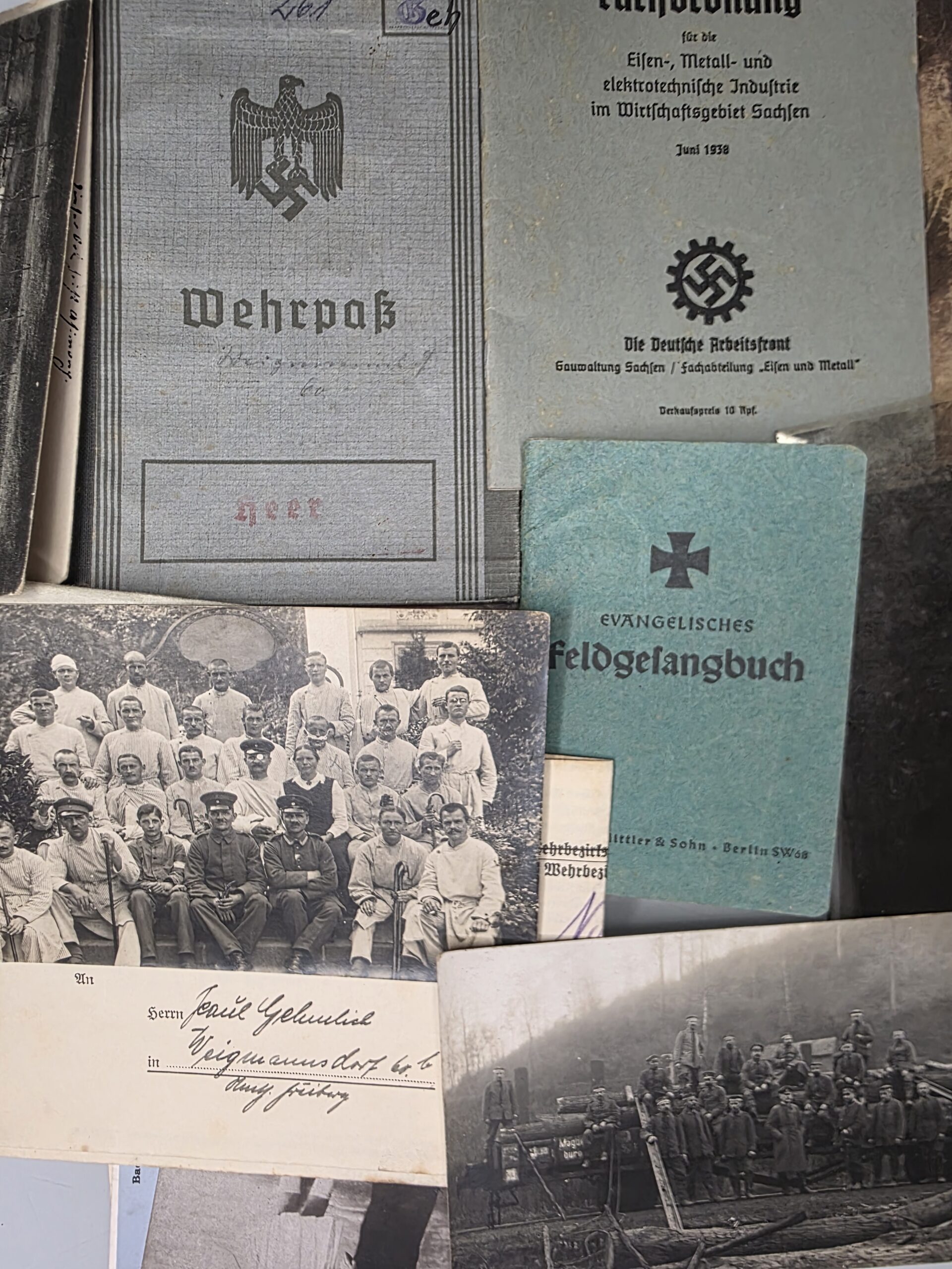 WWII German Wehrpass and Family Estate WWII German Wehrpass with photographs, Feldgesangbuch and DAF documents