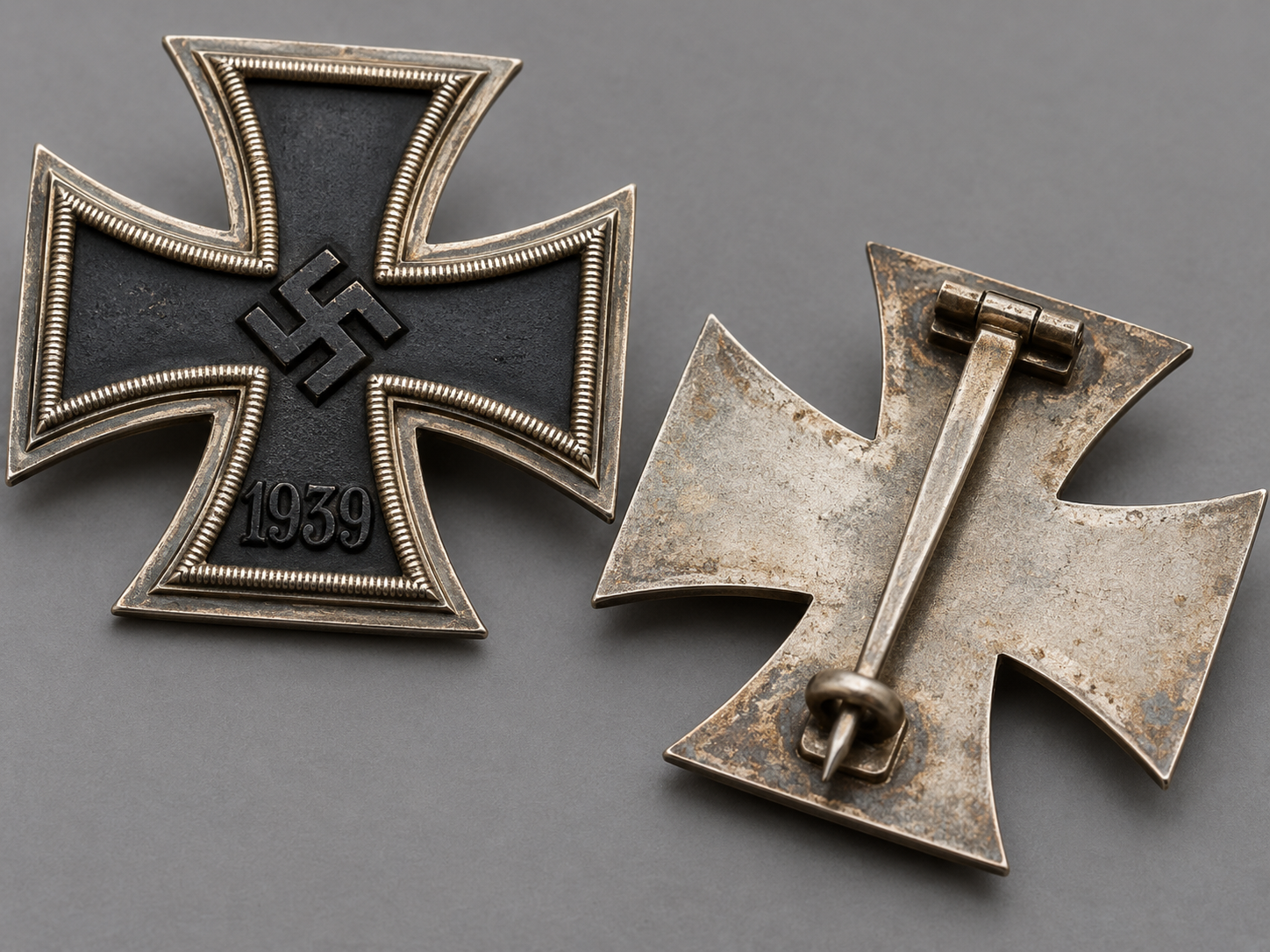Illustrative display of WWII German medals arranged with historical collector research materials