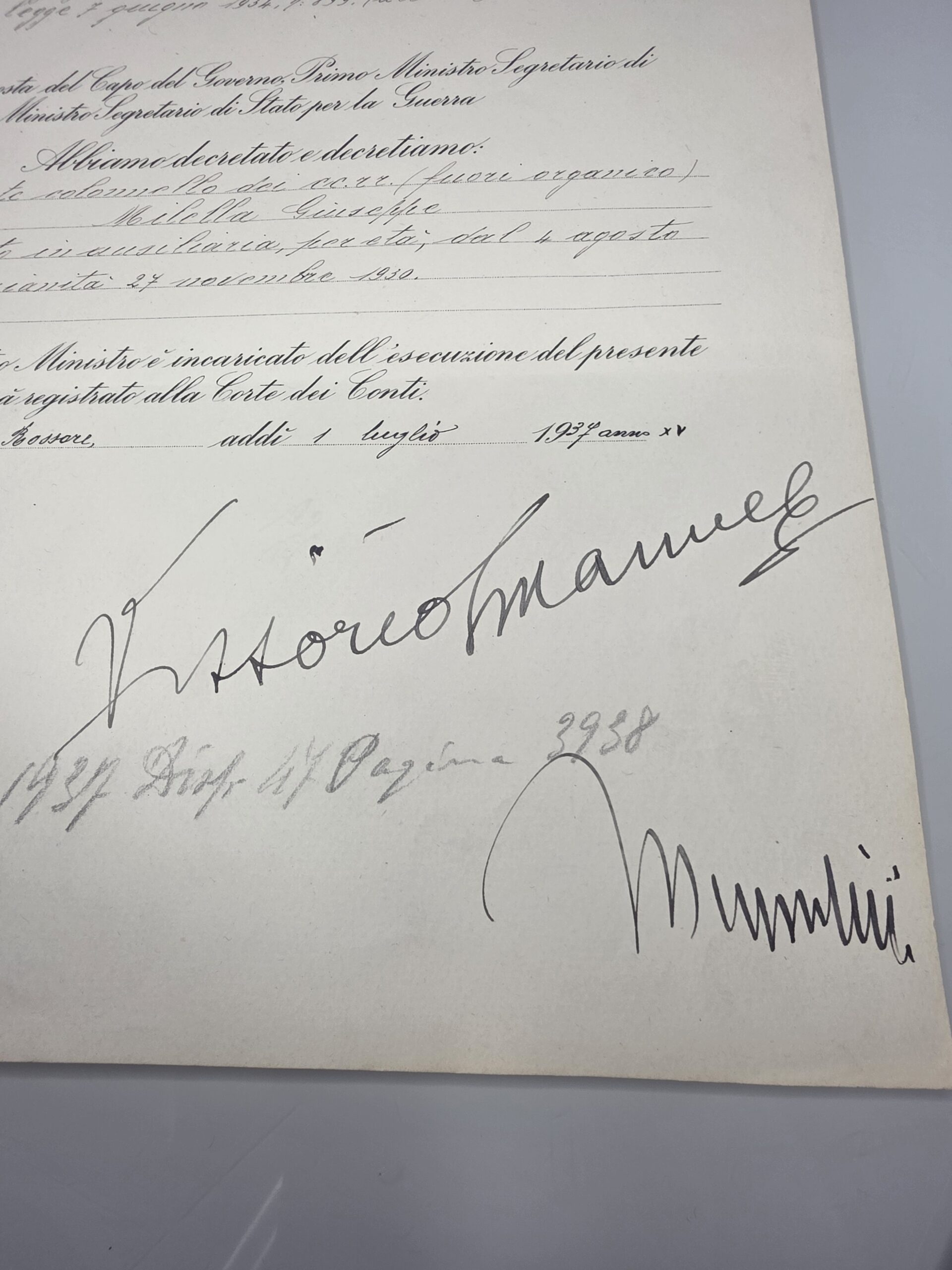 Close-up of Benito Mussolini and Vittorio Emanuele III signatures on 1937 decree