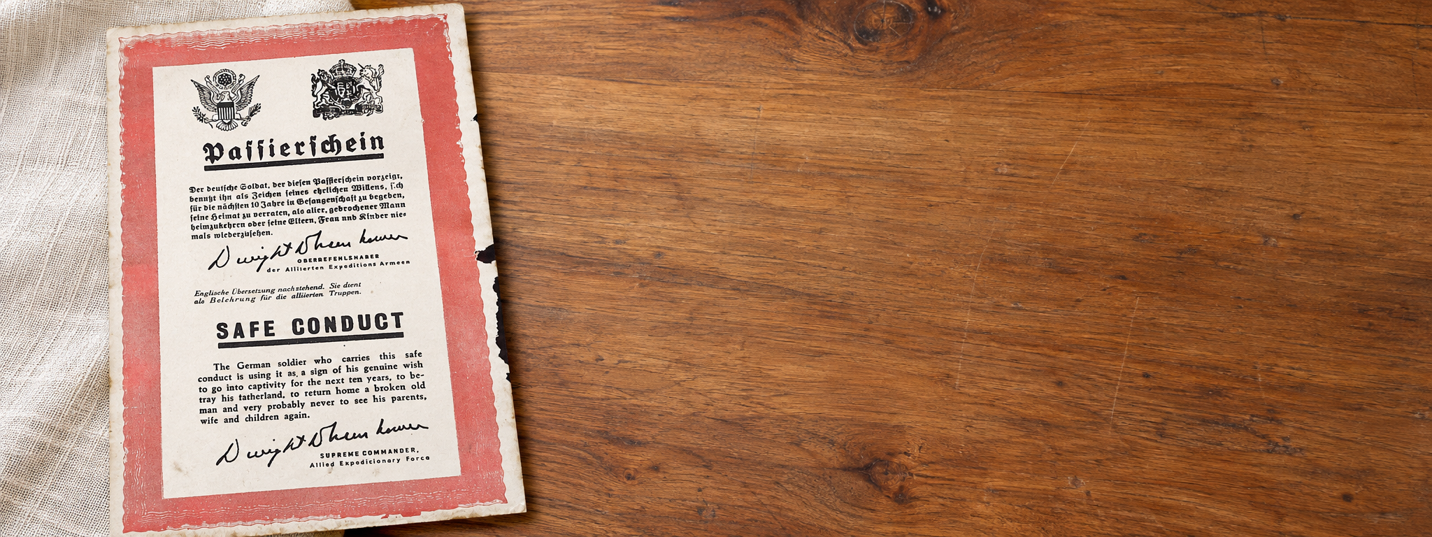 Third Reich material in context: Second World War leaflet on a walnut desk