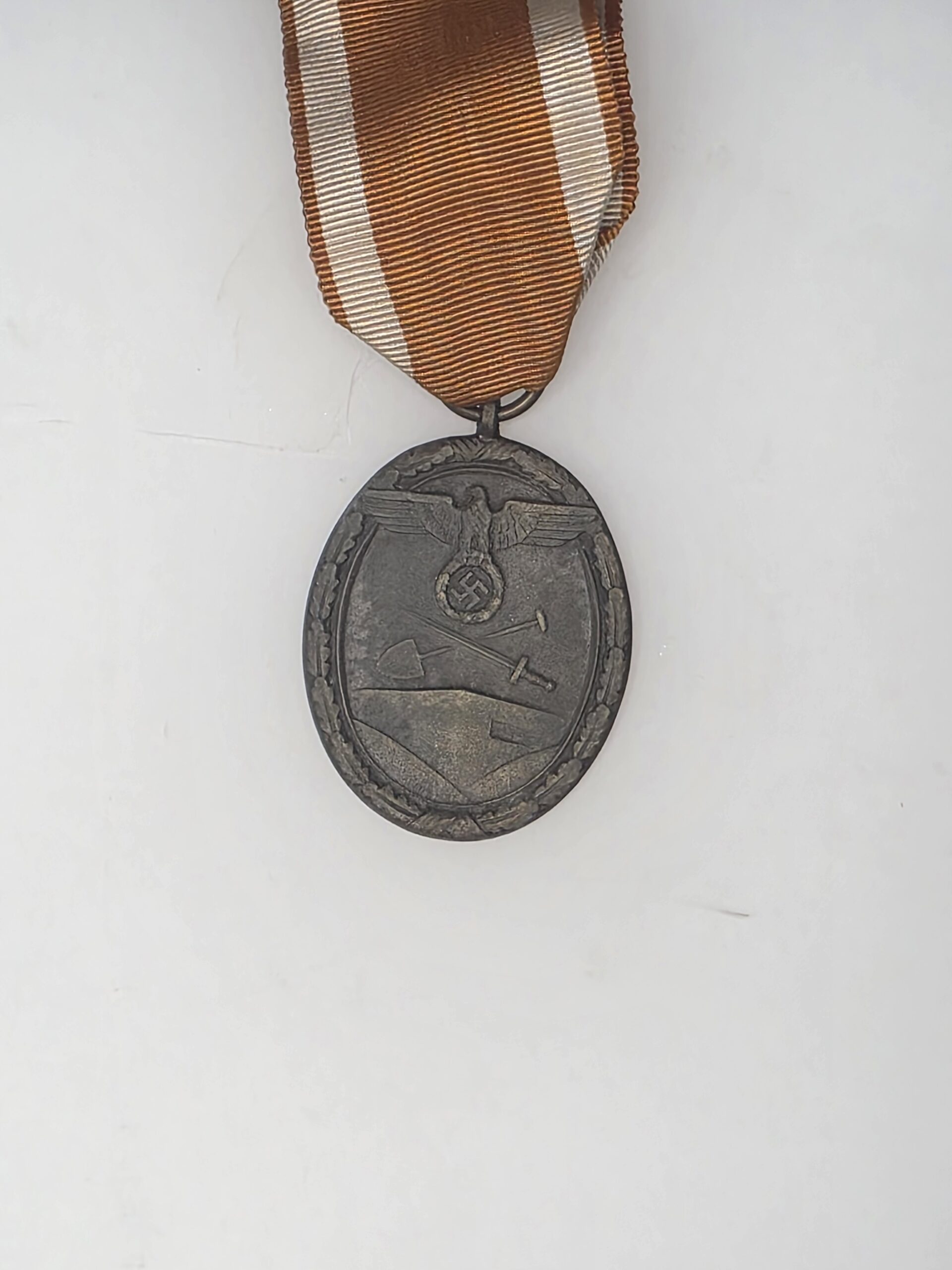 German Schutzwall Ehrenzeichen West Wall Medal with brown and white ribbon