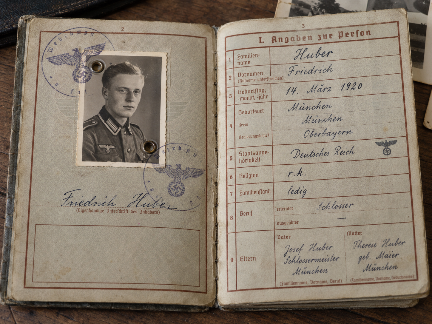 German Wehrpass Archival Research Original WWII German Soldbuch showing photograph, military entries and period service records